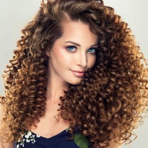 woman with curly hair extensions